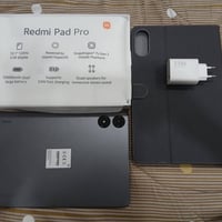 Redmi Pad Pro 256/8  استخدام 4 ايام فقط مع لاصق وحافظ دفتري  الجهاز وا...