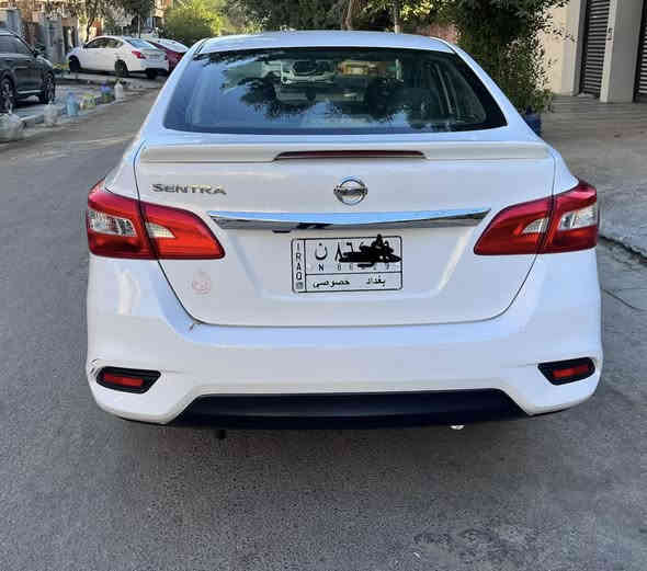 السلام عليكم اخوان 
للبيع نيسان سينترا وارد امريكي ٢٠١٩ لون ابيض 
مواصفات السيارة s.v. عاديه
شاشه و تحكم ستيرن ويل اسود كشنات مخمل لون اسود تبريد شغال مكينه و الكير سي في تي شغال وحالتهم جيده ماكو لاتاخير ولاتبخير..الحداديه و الاطارات جيده 
حادث السياره من امريكا جاملغ الامامي جهه اليسار تبديل و ربع طرف البنيد ايرباك طاك للدشبول و تكم ..ماشيه السياره١٨٠الف كيلو وقابل للزياده
دعاميه بيها شخوط و اكوو ضربه بالدوسه جهه السايق 
السيارة رقم بغداد الالماني حرف ن باسمي وشرط التحويل 
مكانها بغداد الرصافه
سعرها ١٠٤ورقه و بيها مجال ان شاء الله
للاتصال او واتس اب ***********

