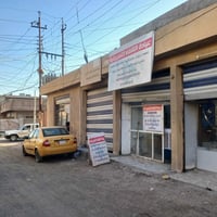 بناية تجارية ركن للبيع تتكون من 5 محلات وصحيات (زراعي) مسلح + رفت مؤجر...