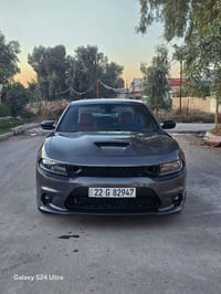 جارجر مديل ٢١ sxt مدث srt  فول بلا فتحه ما مشتغله خط جديده وجاهزه بيها...