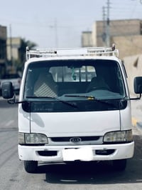 كيا 2000 قمارة وربع بترة 6جنكال مكينه وكير واكسن مكفولات مكينه لاصرف و...