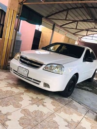 اوبترا 2005 قطعتين والباقي كفاله كير محرك تبريد صدر كله شرط  رقم077084...