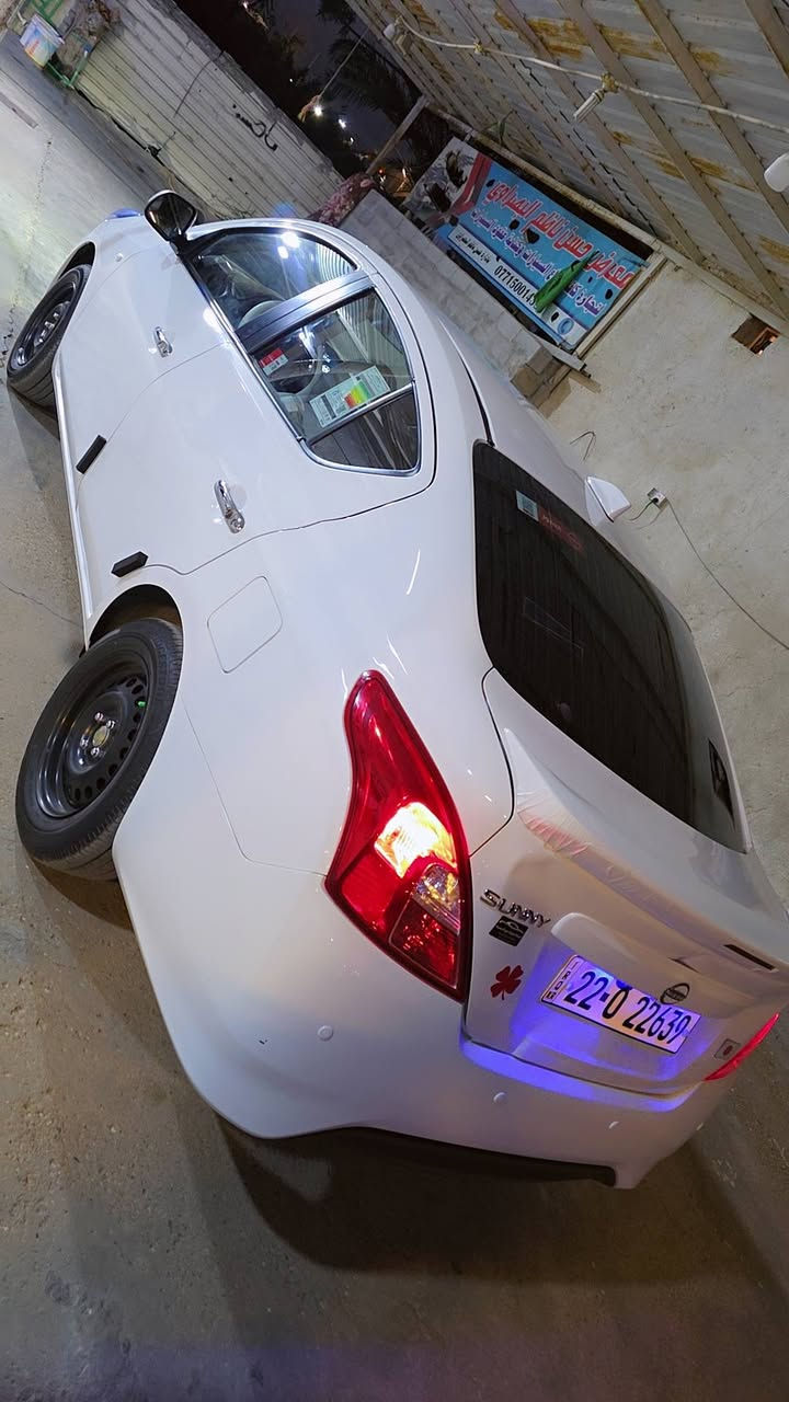 نيسان صني هندي 2025 اربيل ماشي 7 الف فقط سياره جديد حيل دوشمه كامله بيه طخه بل قبق الجنطه باقيه ع حطته الموقع البصره المعقل السعر 126  رقم موبايل ***********/***********
