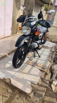 دراجه بوكسر جبلي موديل 22 داخله 23 رقم بغداد وسنويه بأسمي تحويل بنفس ا...