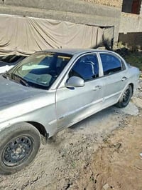 سيارة اوبتما 2001 وقع حال السعر ٣٠ ورقة محرك وكير شرط الشغل 0777531276...