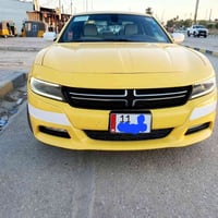 جارجر للبيع موديل ٢٠١٨ أصل رقم بغداد انكليزي مشروع وطني سياره نضيفه تخ...