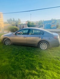 نيسان التيما 2008 فول بصمه رقم انكليزي بغداد سعر/85 /07704811715