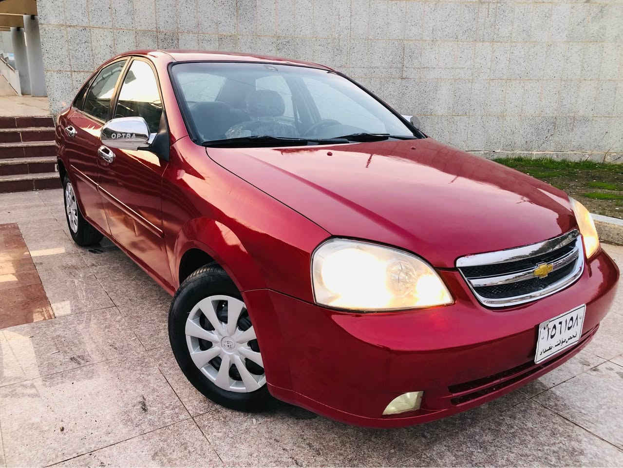 هەرزانترین نرخ 
$42 کۆتای            رانیە          *********** ڤایبەر و واتس ئاپی لەسەرە
شۆفرلێت ۆپترا مۆدێل 2005 بیلاد گێڕ عادی ئاڕم پلاستیک دهۆکە هەمو کوردوستانی پێ بگەڕێ بێ کێشەیە
دەسک مەرزیەیە و هەردو سویچی بیلادی لەگەڵە
سەیارەکە تازە حیزام کورەم کردوە بۆ جوانی سەقفی بۆیاغی نیە
داعم و لێدراوی قورسی نیەو و سەقفو شانی زۆر جوانە 
چوار تایە و پاتری لۆکی بۆ بەسراوە 
گێر مەکینە موس بڕاوە بەشەرت
کارەبای و تندوو تۆڵی بەشەرت
جام کارەبایە و شاشە ئایپادە قفڵ مەرکەزی و کۆنتڕۆڵە
سەیارەکە لێخوڕینی زۆر خۆشەو زۆر بەهەڵمەتە و ماڵی دۆستە رانية, السليمانية
