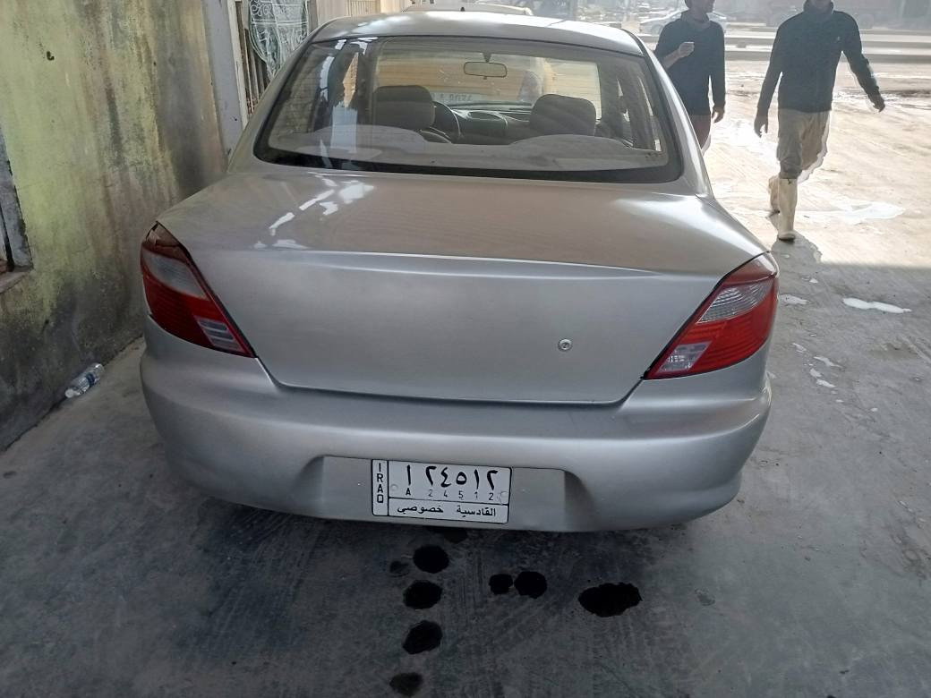 كيا ريو موديل 2003 رقم قادسية جاهزه السيارة مصبوغه عام عن الجراد گير عادي  السعر 30 وبيها مجال العنوان الديوانية رقم الموبايل *********** ديوانية, القادسية
