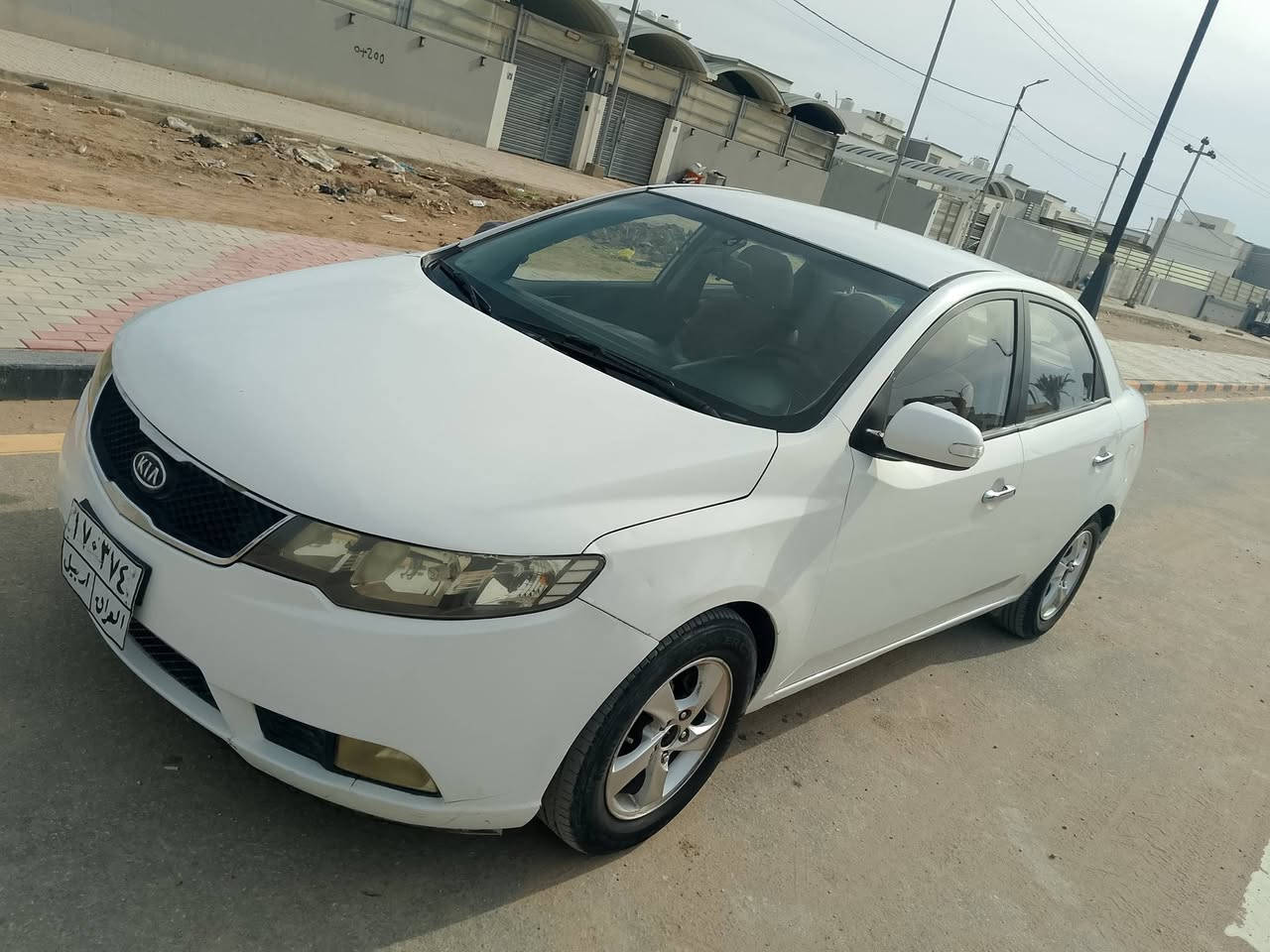 كيا سيراتو أبيض اللون رقم أرييل محرك 1600 العنوان النجف الاشرف رقم الهاتف *********** واتساب
