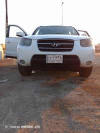 سنتافي 2008مكينه 6/2700رقم بغداد بااسمي مكفولة من الصبغ والتبديل للاست...