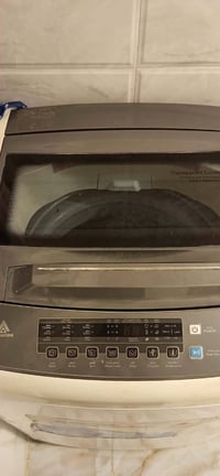 غسالة باب علوي • ١٥ كيلو • شغالة