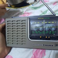 راديو سلفر ياباني لوك  موجتين  أخو الجديد ٢باتري كبير معه الجلد الأصلي...