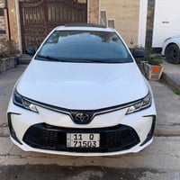 كورلا موديل 2024 خليجي هايبرد رقم بغداد بأسمي ماشيه 29 الف مكفوله كفال...