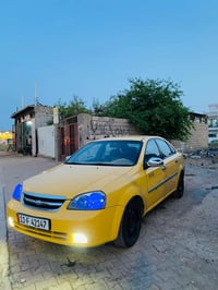 سلام و عليكم اخوان اوبتره موديل ٢٠١٢  كير عادي  رقم بغداد سياره بسمي ك...