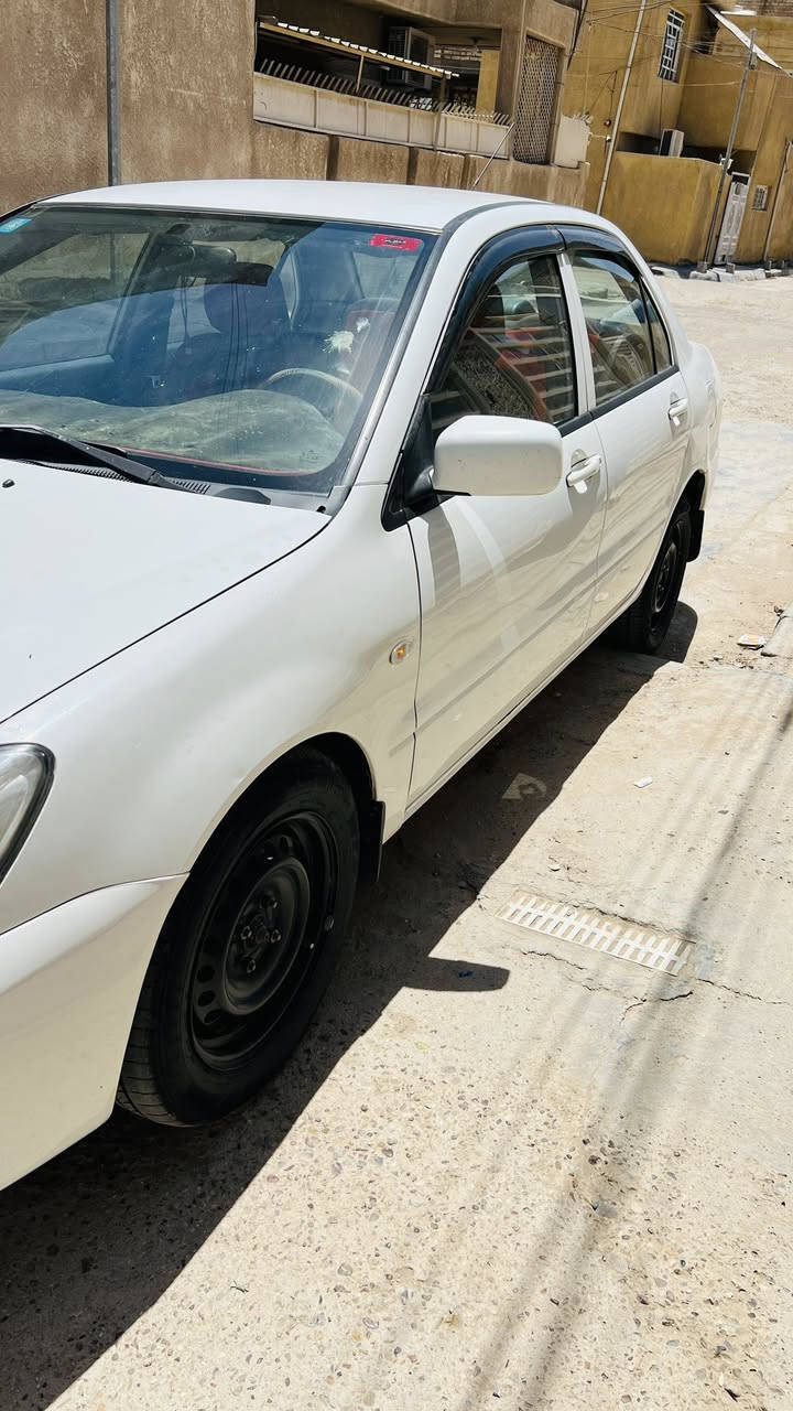 لانسر 2011 الشركة العامه حره بأسمي كير ومحرك جدد محرك 2000 بدلته على ايدي تخم تاير وصدر خير من الله سياره جاهزه السعر 85 ***********
