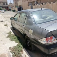 لانسر ٢٠١٠ مكينه ٢٠٠٠ بلادية مكينه وكير وتبريد خير من الله تخم تاير جد...