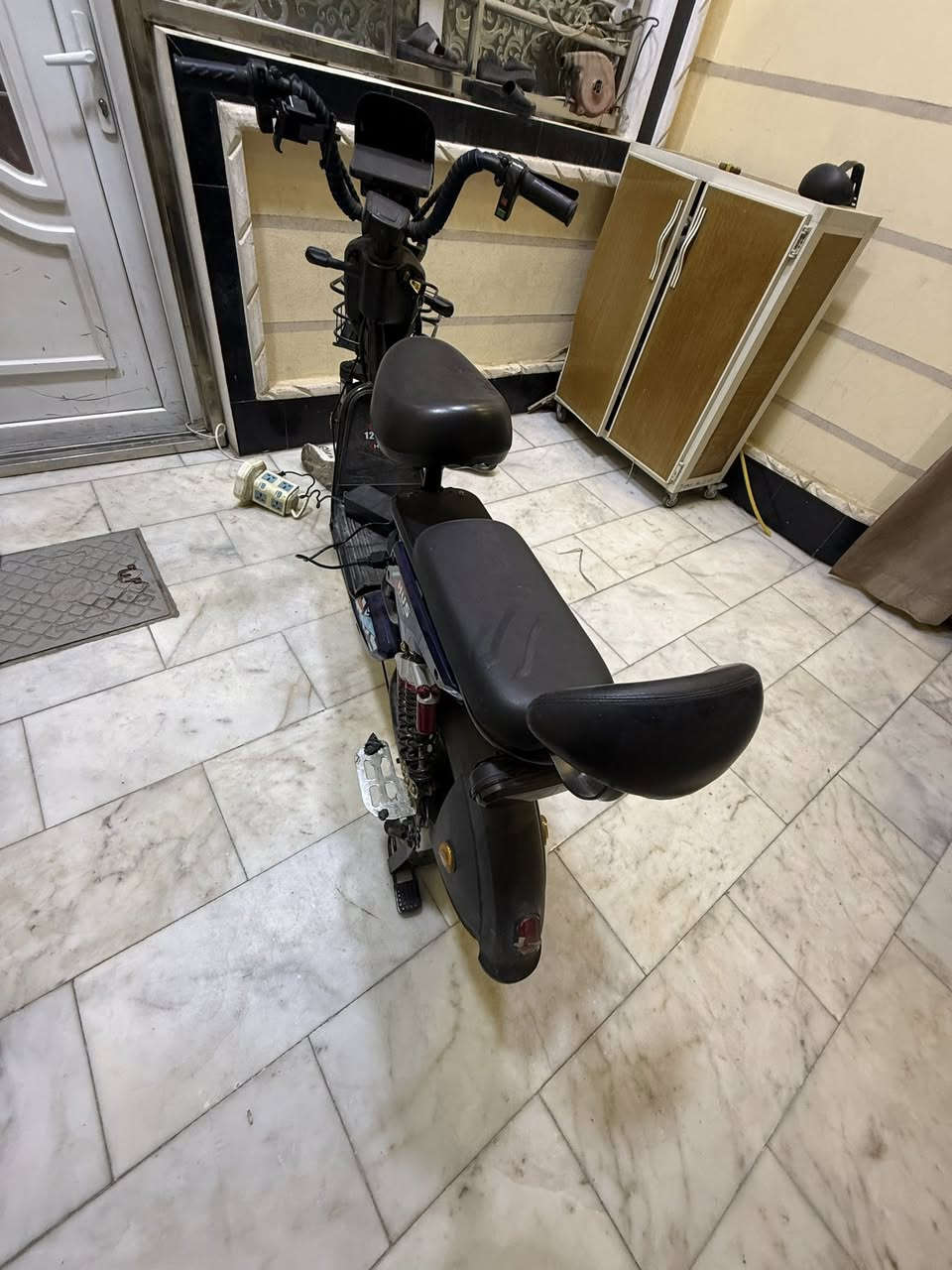 دراجه شحن استعمال قليل يعني تقريبا جديده مكاني نجف رقم ***********
