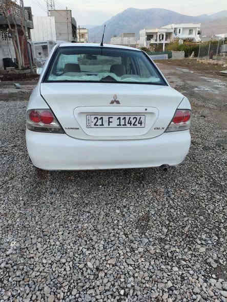 لانسەر2011مە کینە گەورە چوارپارچەونیوو بویاغە بی دواوەی کە میکی گرتووە مە کینە گە ورە سەنەوی نویە تانزیک  2029ماڵی دوستە هە موو شتی بە شەرت شوین ڕانیە حاجیاوا نرخی 84گە ڵا *********** رانية
