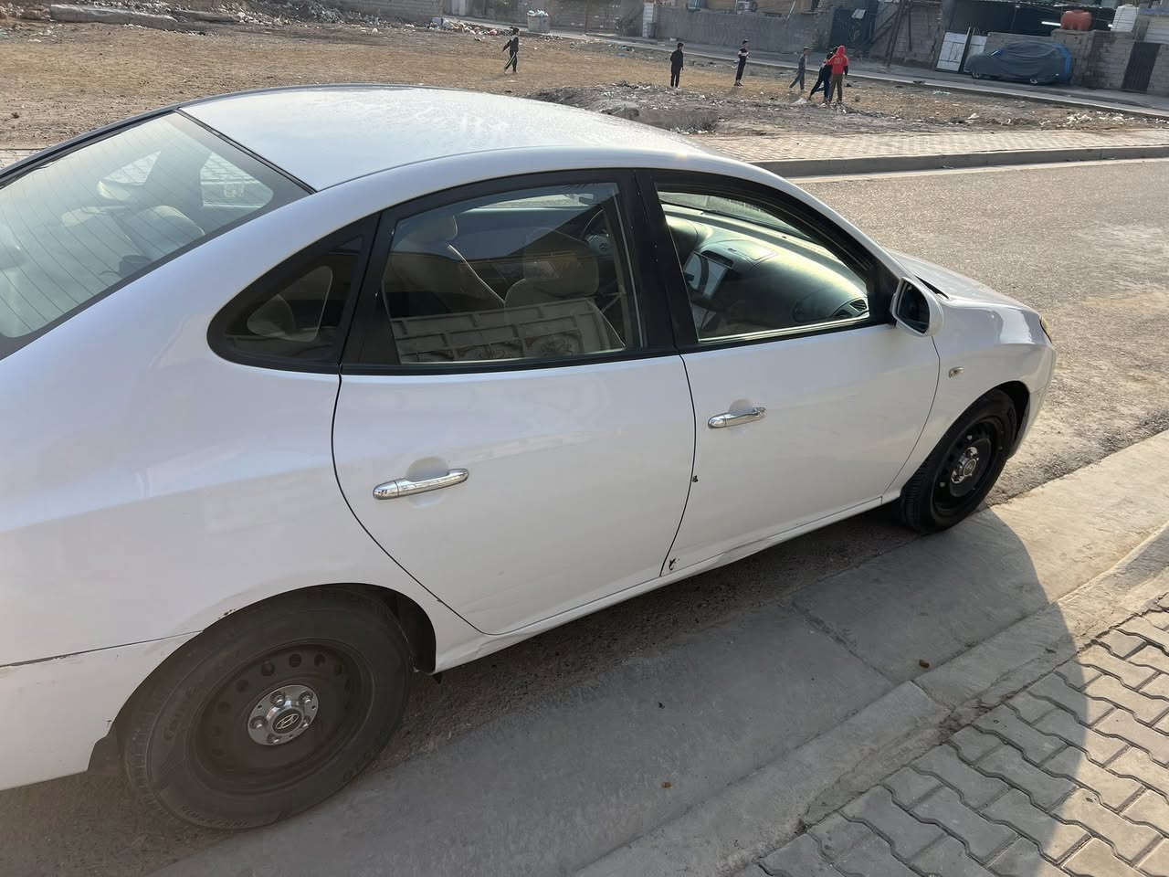 أفانتي موديل 2007بغداد باسمي هزه وسنويه وارقام جدد.گير ومحرك وتخم تاير جديد شاشه وكامره HD.  مكفوله لاصبغ ولا حادث ولاتبديل محرك 1600 دوش دكشن عالي مكفول مامفتوحه مبدله جديد السعر 107 وبيها مجال المكان بغداد المحموديه ناحية اللطيفيه ***********/***********
