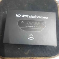 كاميرا سرية • ساعة مكتب