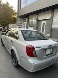 فورنزا 2006 رقم بغداد الجديد تبريد شغال بارد ترايه حلو شاشة كامره سيار...