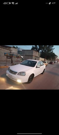 عندي اوبتره مديل 2005مصبوغه حزام للجماليه وبيهه جاملغ امامي مبدل بي طخ...