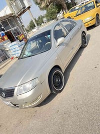 نيسان سني موديل 2007 رقم بغداد بسمي مصبوغه عام لجماليه مكينه كير حدادي...