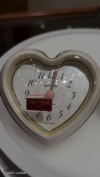 ⏰ زوج ساعات مكتبية يابانية – RHYTHM تصميم قلب أنيق 🤍✨  ▫️ الماركة: RHY...