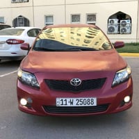 07815805476 واتساب  كورلا موديل 2009 وارد امريكي رقم بغداد باسمي ماشية...