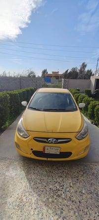 اكسنت • ٢٠١٤ • اصفر تكسي