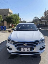 MG 5. 2025 رقم اربيل السيارة فئة الاستندر  الداخل أبيض  فول تحكمات ستي...