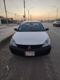 لانسر • ٢٠١٠ • مكينة جديدة