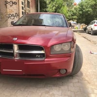 سياره جارجر2009 سنويه جديده ارقام انكليزيه جديده رقم بغداد مصبوغه حزام...