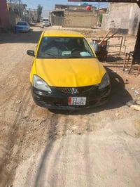 لانسر ٢٠١٠صدر جديد تبريد شغال  كير اوتماتيك ٦نمره سنويه ل٢٠٣٦ رقم انكل...
