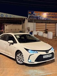 كورلا هايبرد 2024  ماشيه /17الف  سياره جديده كلش ملاحضه/ بيها بيدي ار ...