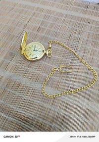 ساعة جيب • ذهبية • كوارتز