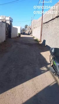 الرمادي البوفراج • ٤٠٠م • واجهة ١٥م