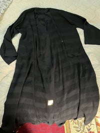 مجموعة ملابس • كلهن