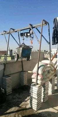 رافعة كهربائية • رفع مواد بناء • الموصل الايسر