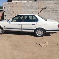 بي ام730 موديل 1992 محرك3000 لون ابيض رقم بغداد بأسمي سيارة جديدة كل ن...