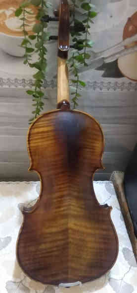 لعشاق الة الكمان (*********** )
