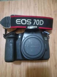 كامرة كانون 70D • عاطلة بدون بطارية • شاحن وحزام كتف