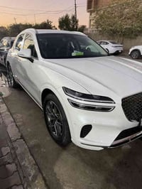 جنسس GV70   موديل 2023 – محرك • لون: ابيض   • ماشية: 31كم  • داخلية فخ...