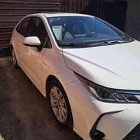 كورلا هايبرد موديل ٢٠٢٥ ماشيه ٨٠٠٠ كلش جديده والسونر مرفق مع الصور كفا...