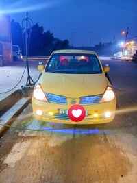 للبيع قسد او نقد  نيسان تيدا ياباني 2006 رقم بغداد انكليزي مكينه وكير ...