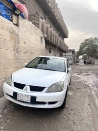 لانسر بومة 2011 الشركة العامة سيارة كير ومحرك مكفولات السيارة مبيهة اي...