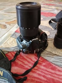 نيكون D7200 • عدسة ١٨-١٤٠مم • حالة ممتازة