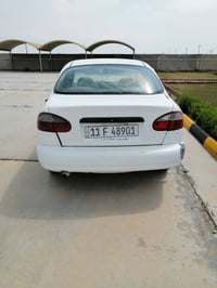 وبركاته دايو لانوس موديل ٢٠٠٠ رقم بغداد باسمي السعر ٣٠ ٠٧٥١٩١٤٨١١٠ 077...