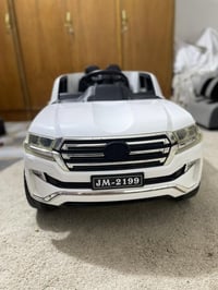 عربية أطفال • بطارية 12v • باب يفتح